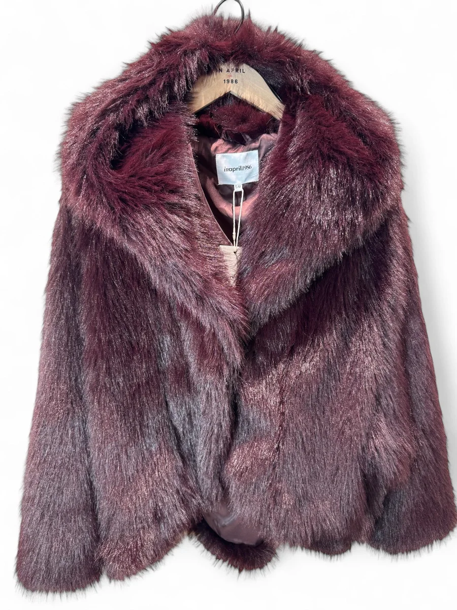 Veste en fausse fourrure avec capuche | Lestigresses.fr