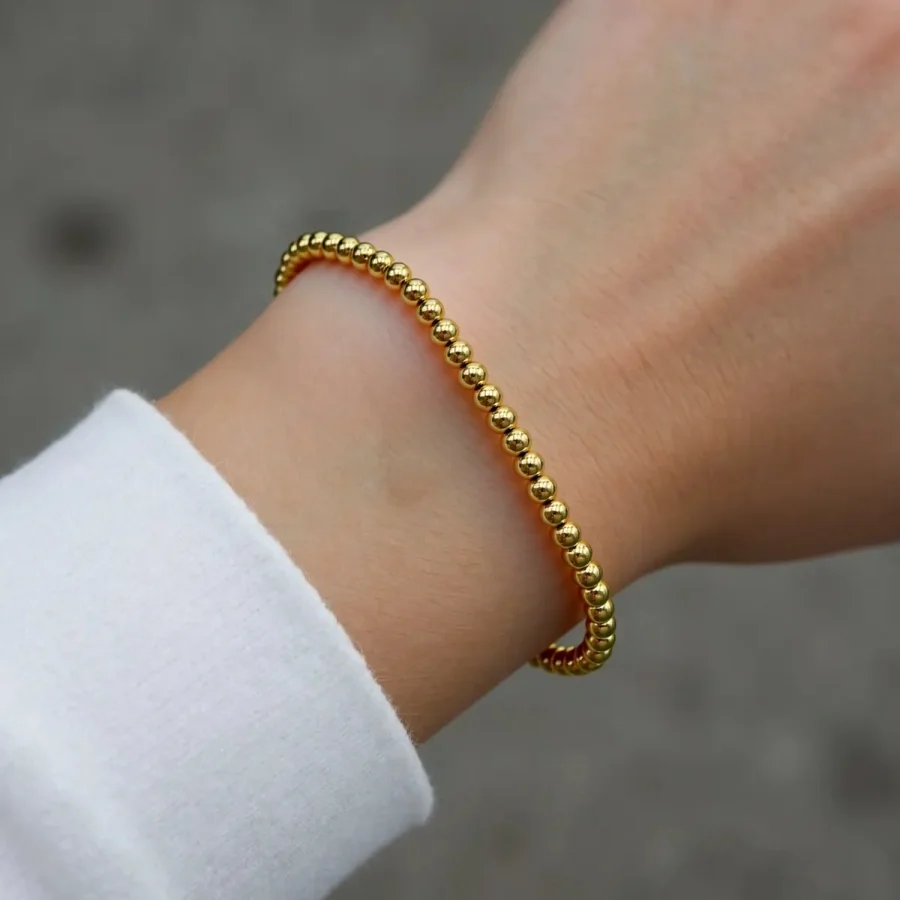 BRACELET BOULES A ÉLASTIQUE (4mm de diamètre) EN ACIER INOXYDABLE: IDÉAL POUR PERSONNALISER AVEC NOTRE SÉLECTION DE CHARMS | Bijoux fantaisie en acier inoxydable