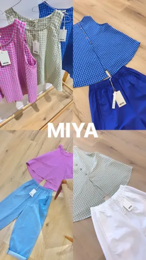 MulherTops de distribuidor de roupas Miya em Itália